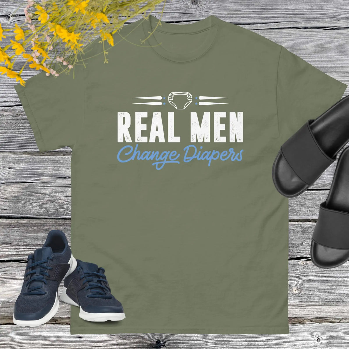 Celebrate fatherhood with our exclusive Father's Day army green t-shirt! Crafted from 100% premium cotton, showcasing a bold statement: "Real Men Change Diapers." A declaration of modern fatherhood proudly proclaiming that changing diapers is not just a mom's job—it's a real man's duty!