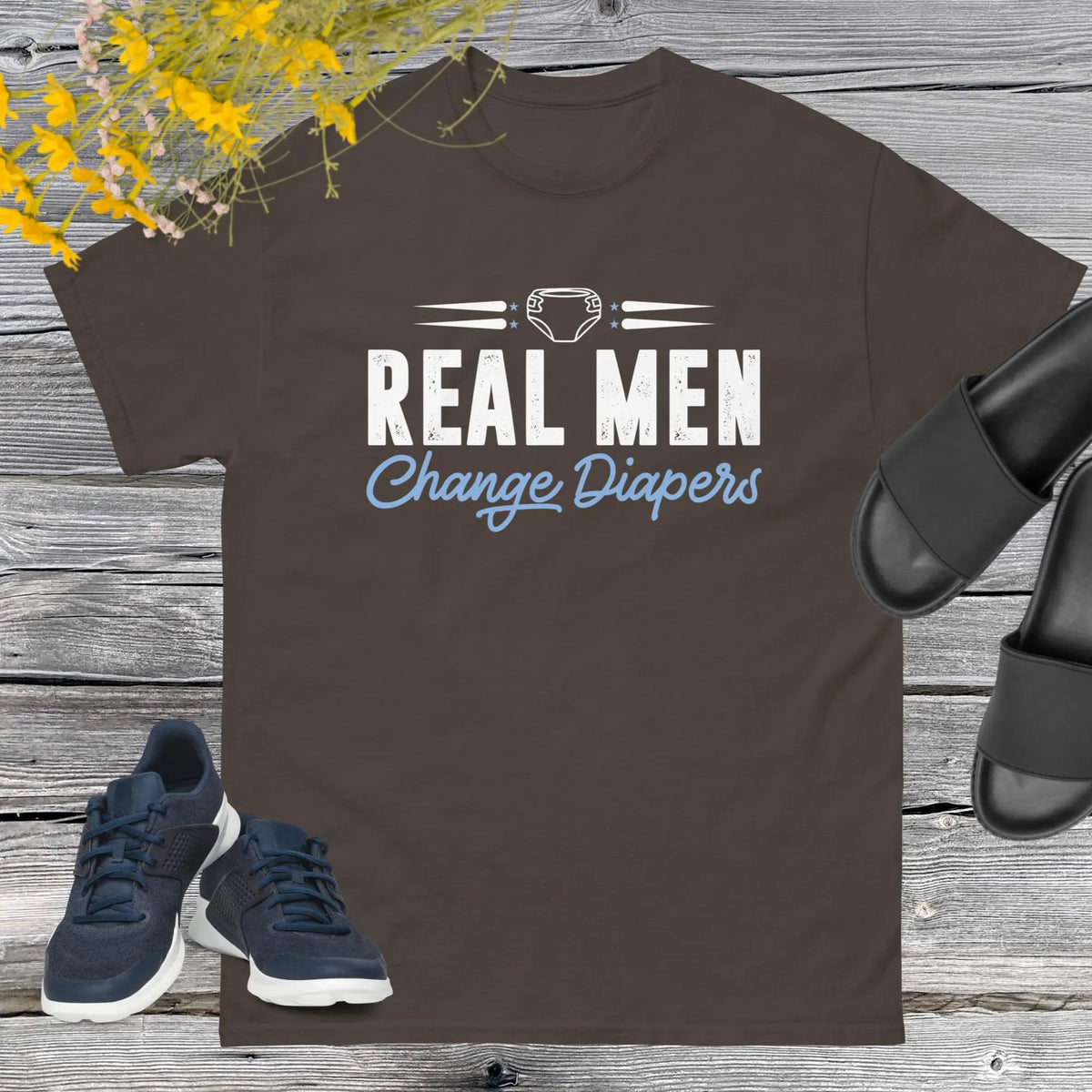 Celebrate fatherhood with our exclusive Father's Day chocolate t-shirt! Crafted from 100% premium cotton, showcasing a bold statement: "Real Men Change Diapers." A declaration of modern fatherhood proudly proclaiming that changing diapers is not just a mom's job—it's a real man's duty!
