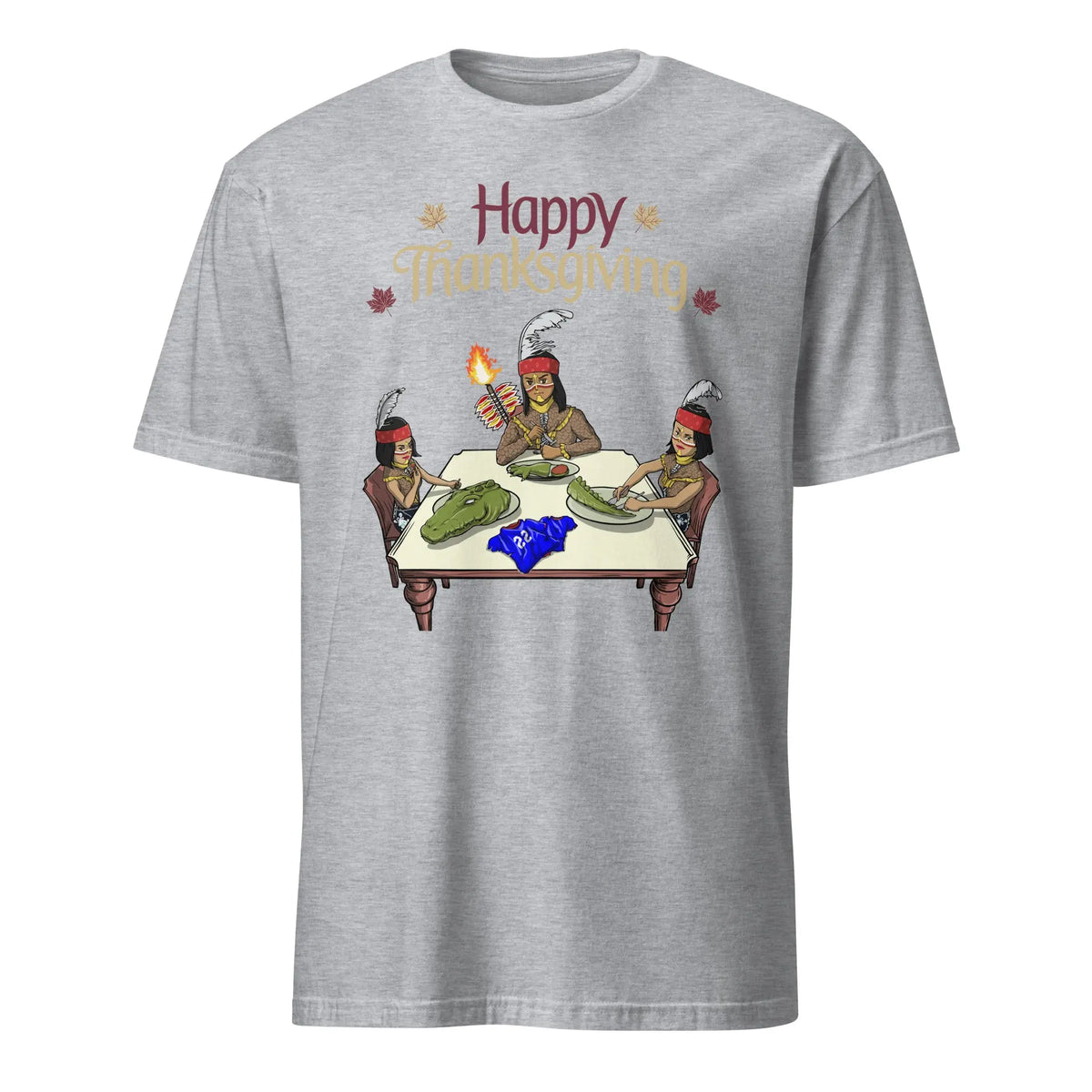 Grey t-shirt with ‘Happy Thanksgiving’ text above three cartoon Seminole characters carving and serving a cooked Florida Gators mascot at a holiday dinner table.