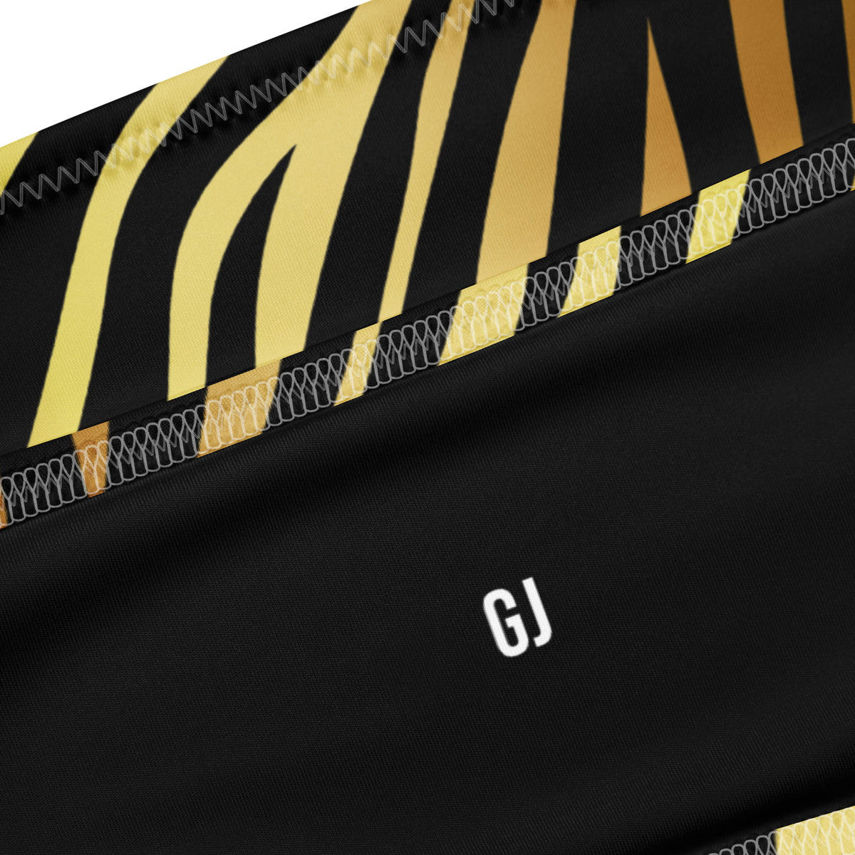 Closeup of a Black and gold zebra print bandeau bikini with strapless top and V-cut high-leg bottom