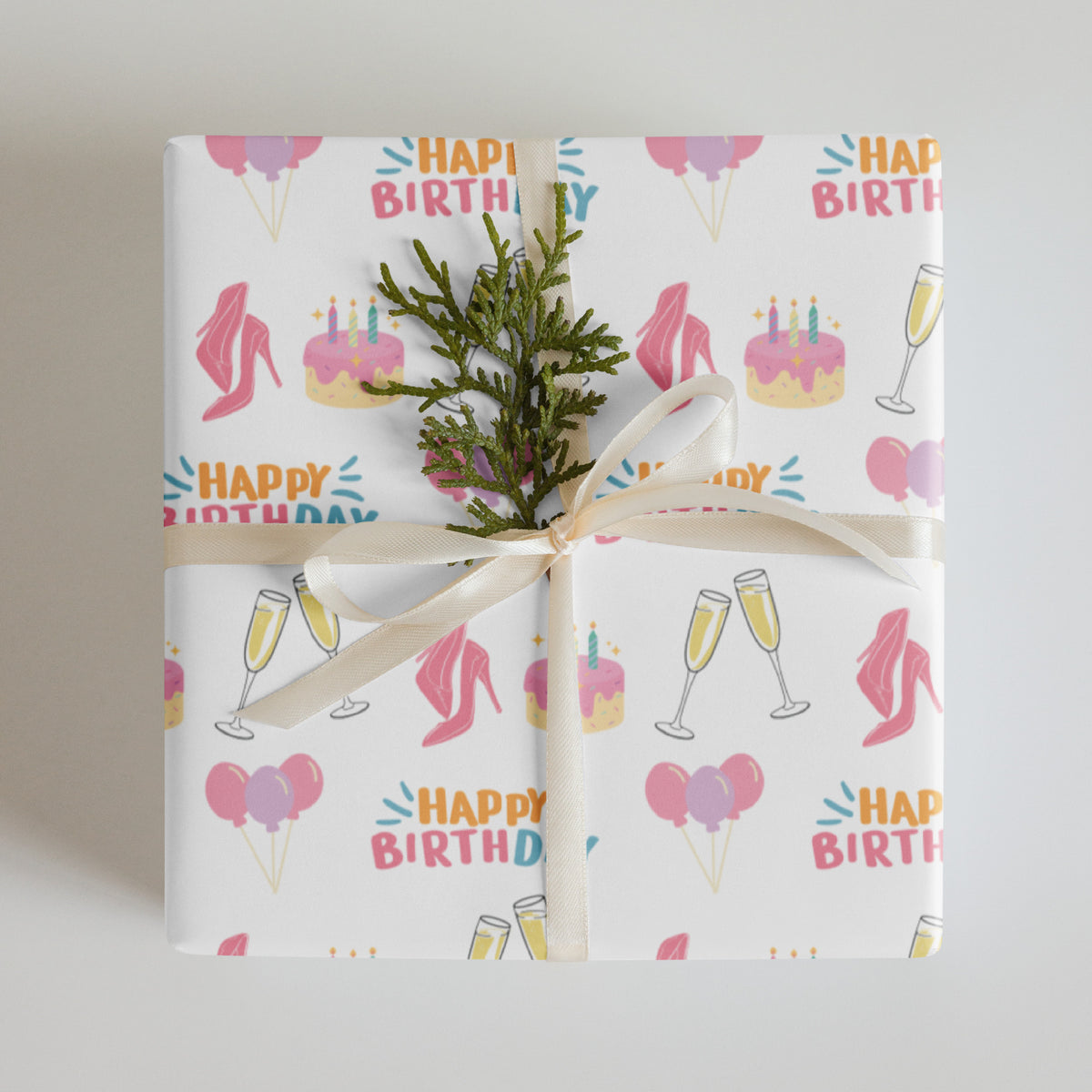 Chic birthday gift wrap with pink heels, cake, balloons, and champagne icons on a white background
