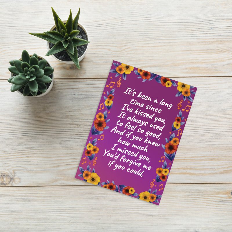 Purple floral I miss you greeting card with romantic message and orange musical-note accents