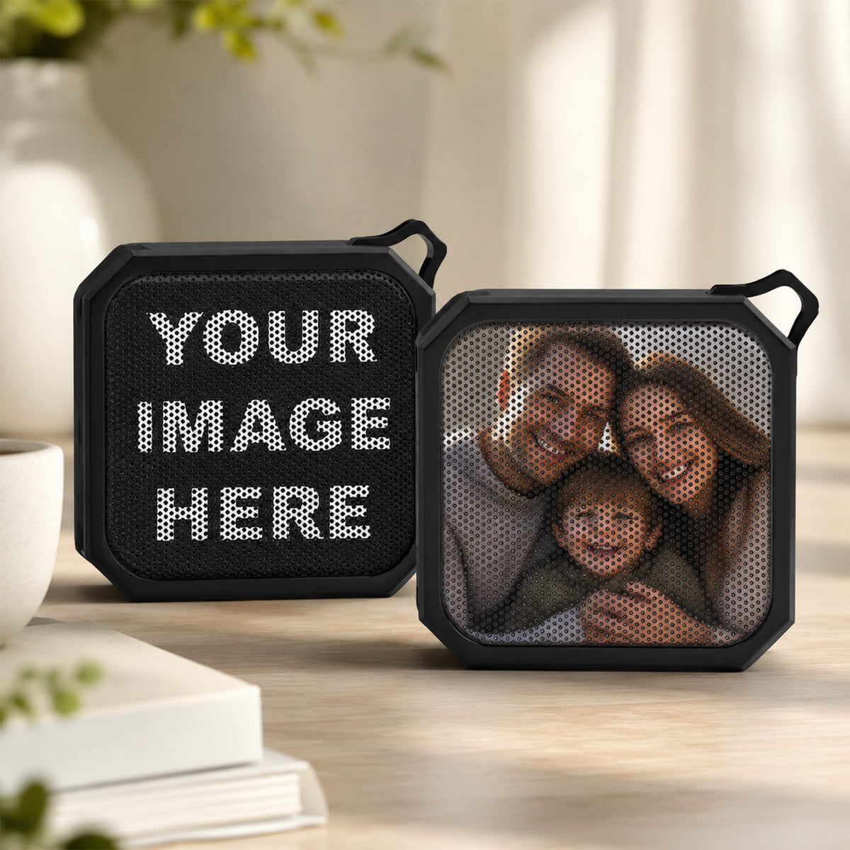 Personalized portable Bluetooth speaker with custom photo or artwork, built-in controls, carabiner clip, and water-resistant design
