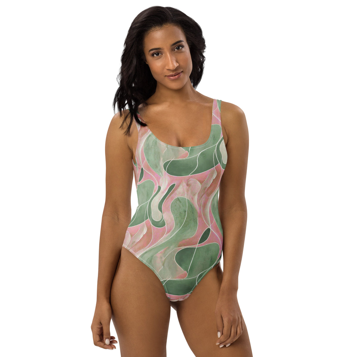 Model wearing a Pink and green retro abstract marble-print one-piece swimsuit with scoop neckline and cheeky fit