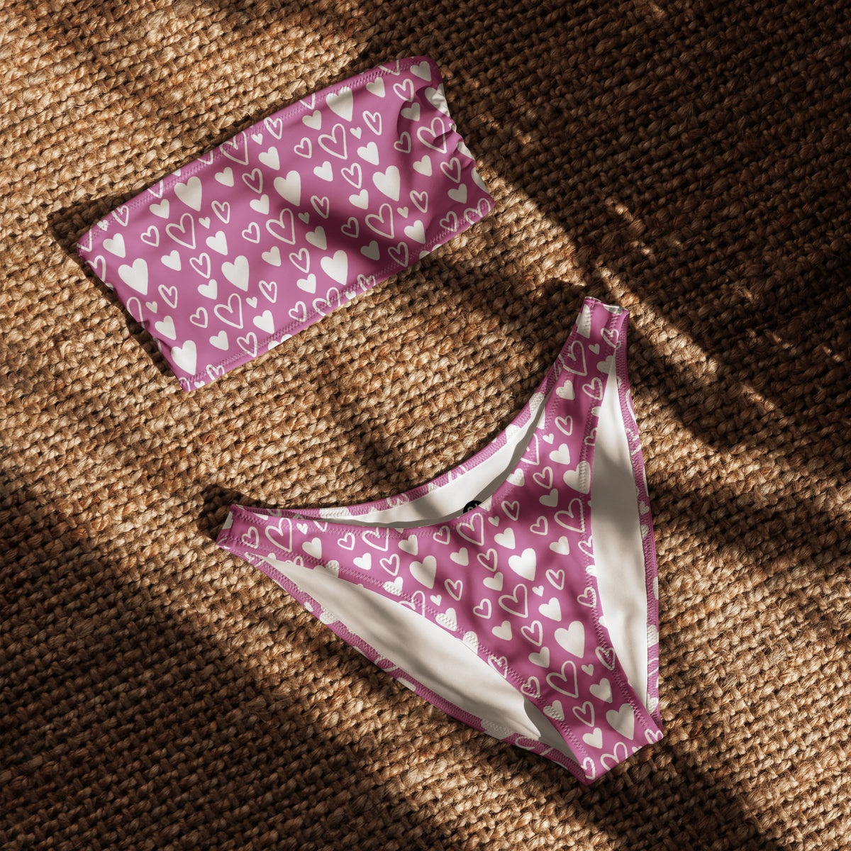 Pink and white heart print bandeau bikini with strapless top and high-waist high-leg bottom