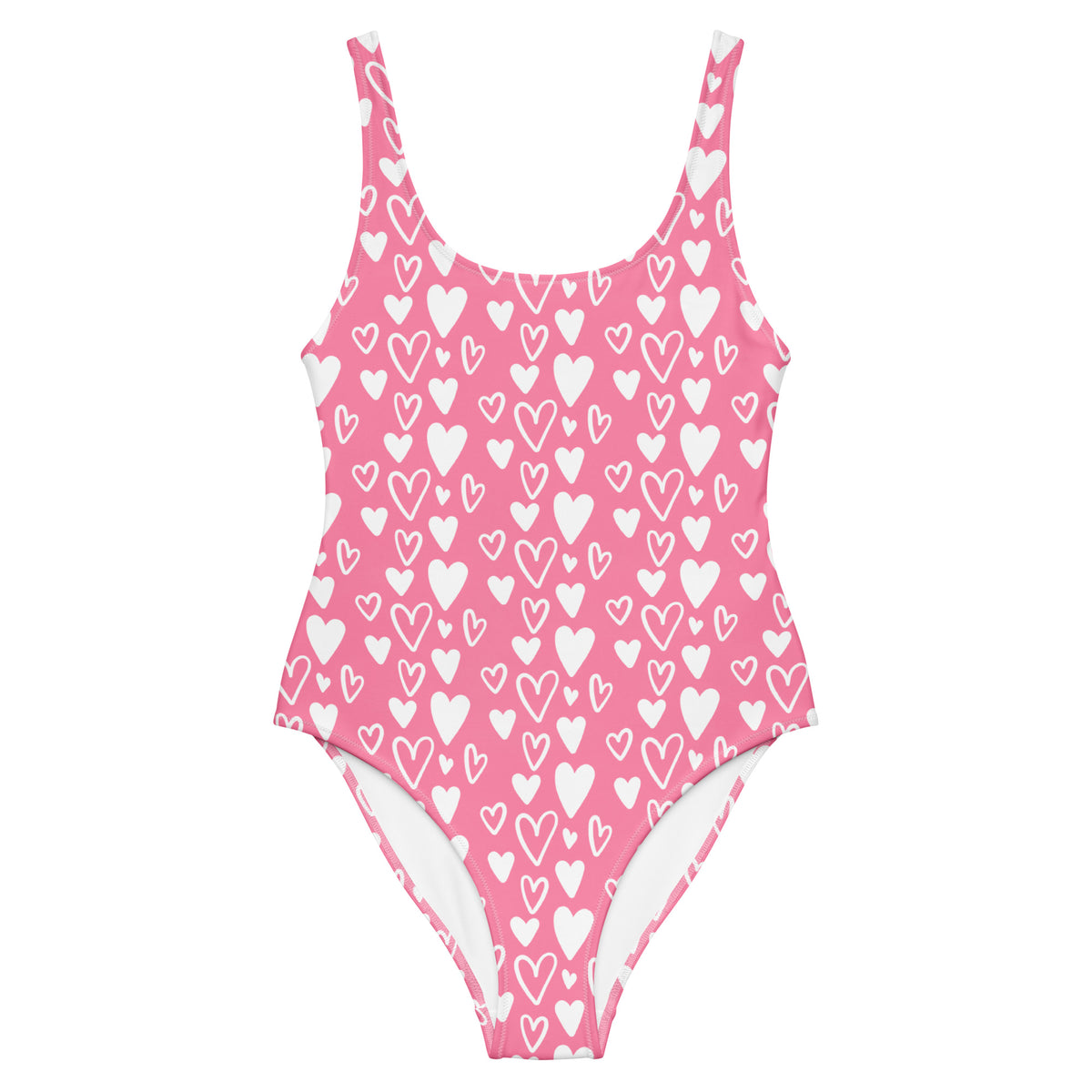 Pink one-piece swimsuit covered in solid and outlined white hearts with a scoop neckline and cheeky fit