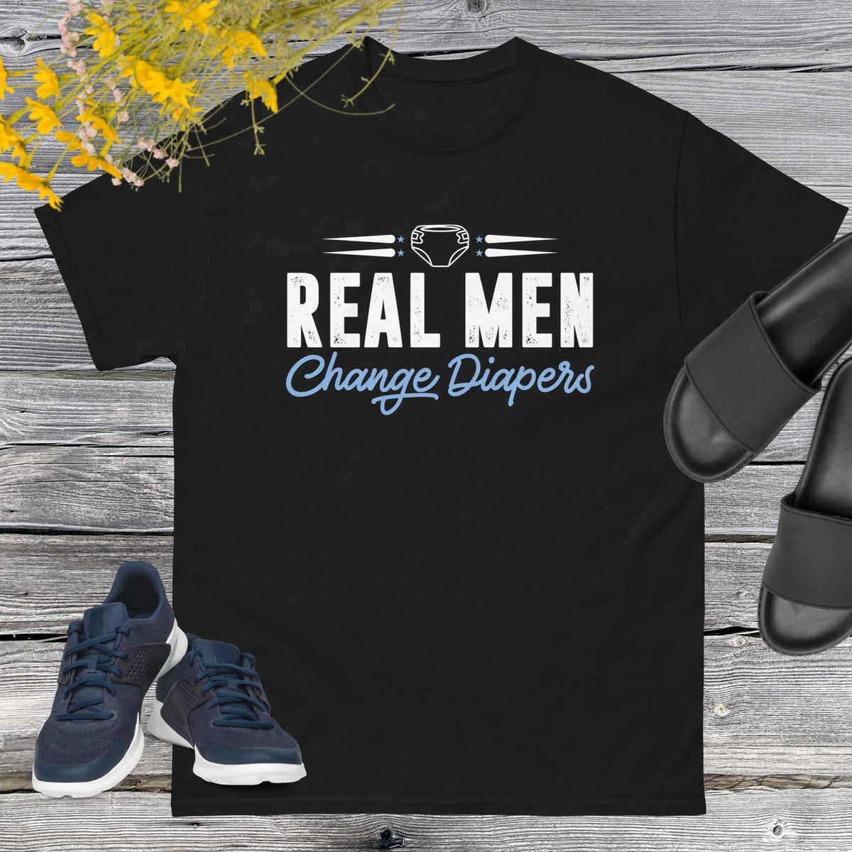 Celebrate fatherhood with our exclusive Father's Day black t-shirt! Crafted from 100% premium cotton, showcasing a bold statement: "Real Men Change Diapers." A declaration of modern fatherhood proudly proclaiming that changing diapers is not just a mom's job—it's a real man's duty!