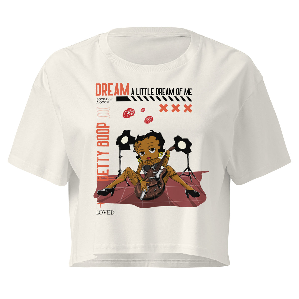 Ecru women’s crop top with Rockstar Betty Boop graphic holding guitar under stage lights
