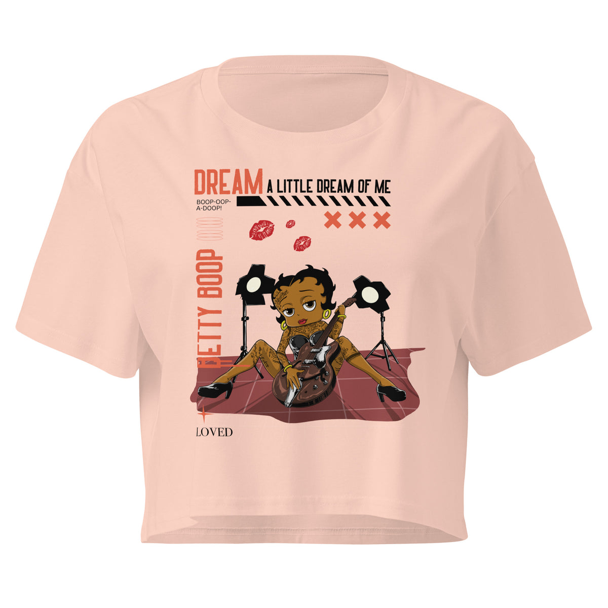 Pale Pink women’s crop top with Rockstar Betty Boop graphic holding guitar under stage lights