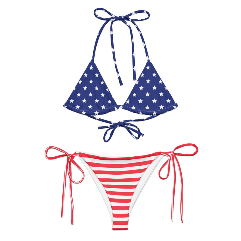 Patriotic two-piece string bikini with blue star triangle top and red-and-white striped tie-side bottoms