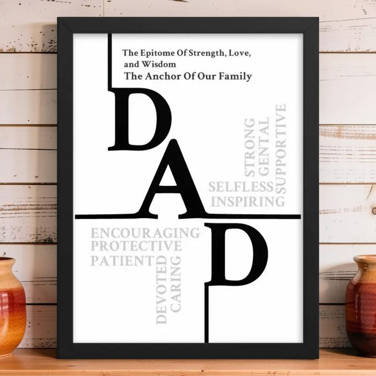 Framed print with text about a dad on a wooden surface.