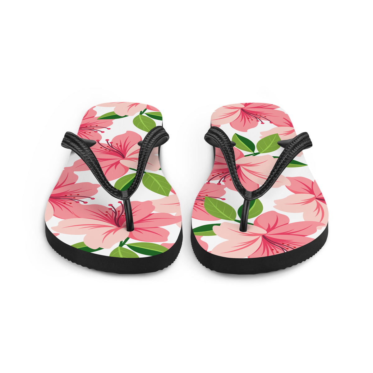 Pink floral print flip-flops with black straps and tropical flower design