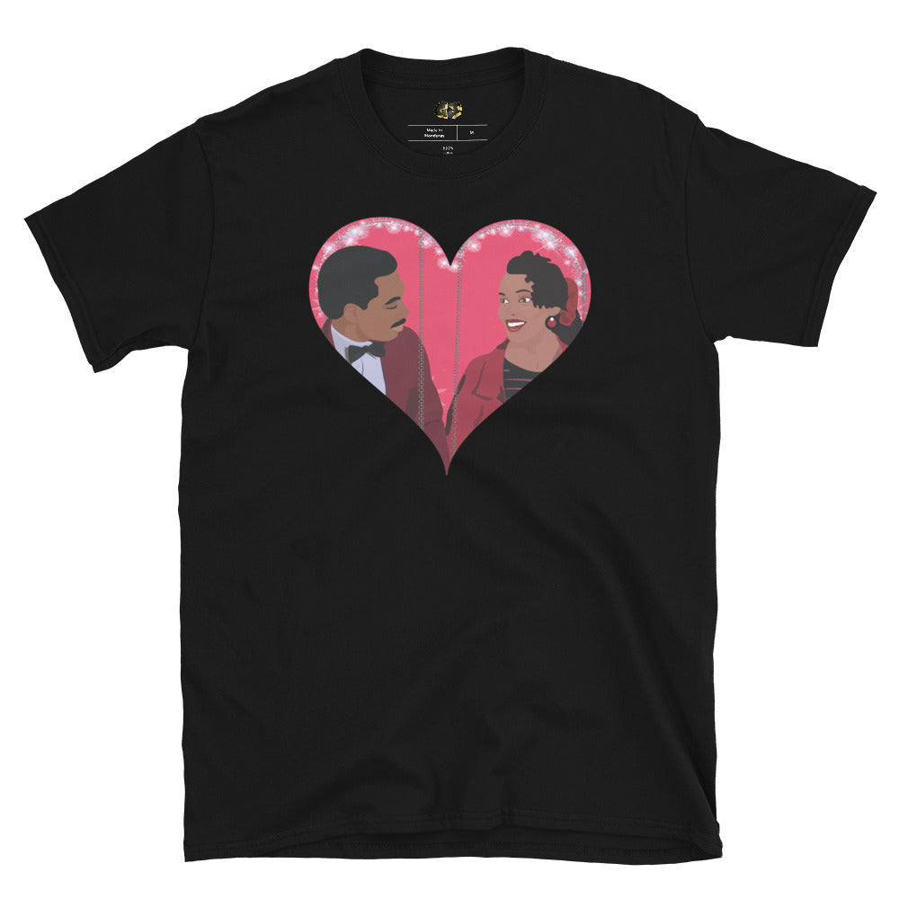 "Royal Love" black t-shirt, featuring a vibrant pop art illustration of Akeem and Lisa McDowell from the iconic film *Coming to America*. This charming design showcases Eddie Murphy and Shari Headley in a heartfelt embrace within a shimmering heart, capturing the magic of their on-screen romance