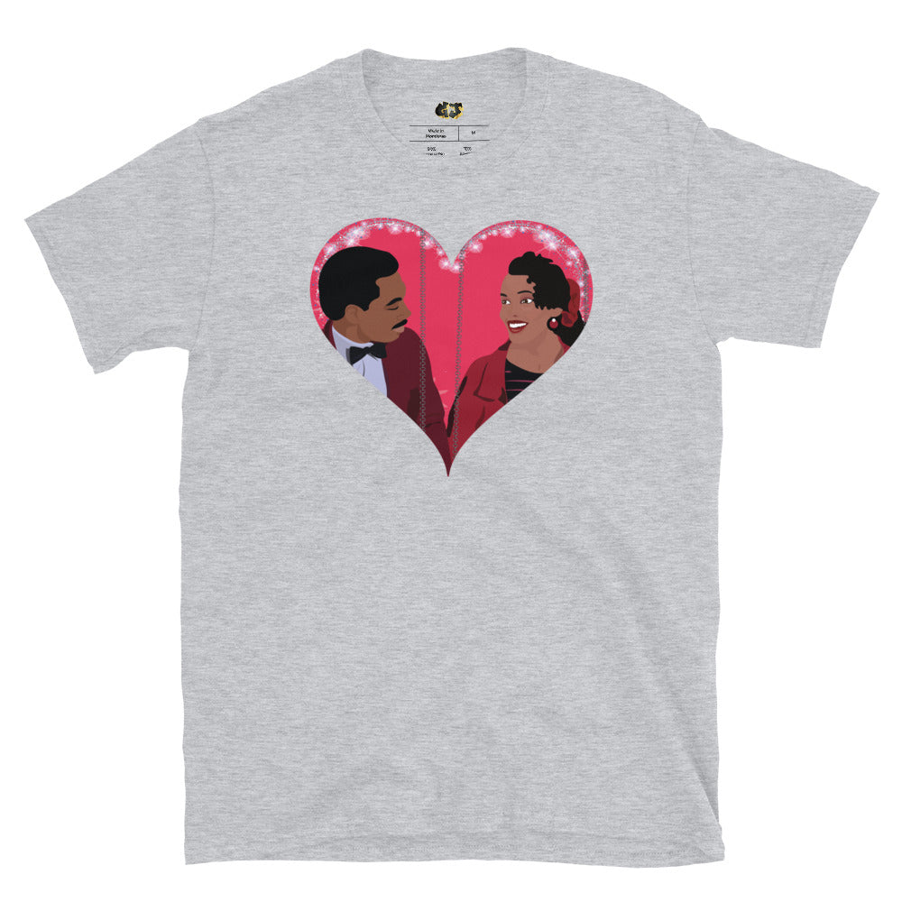 "Royal Love" grey t-shirt, featuring a vibrant pop art illustration of Akeem and Lisa McDowell from the iconic film *Coming to America*. This charming design showcases Eddie Murphy and Shari Headley in a heartfelt embrace within a shimmering heart, capturing the magic of their on-screen romance