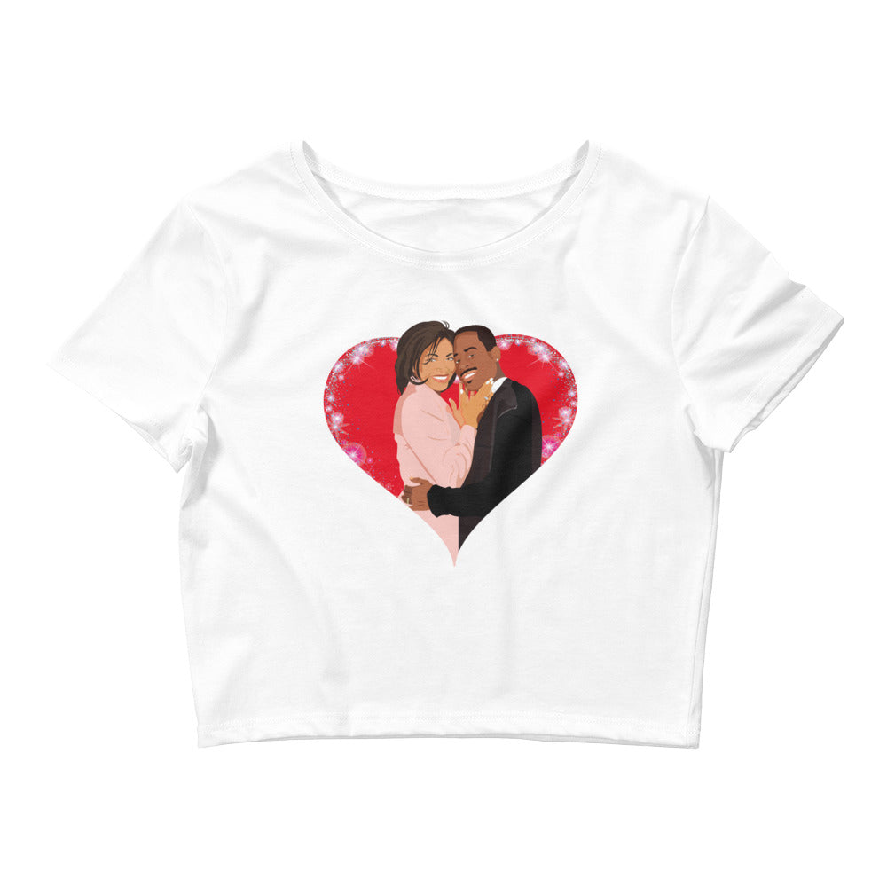 Celebrate love and nostalgia with our "Heartfelt Classic" cropped tee, featuring a vibrant pop art illustration of Martin Payne and Gina Waters from the beloved TV show *Martin*.Perfect for couples who cherish the magic of Martin Lawrence and Tisha Campbell's legendary TV partnership, this shirt offers a stylish nod to their favorite show.