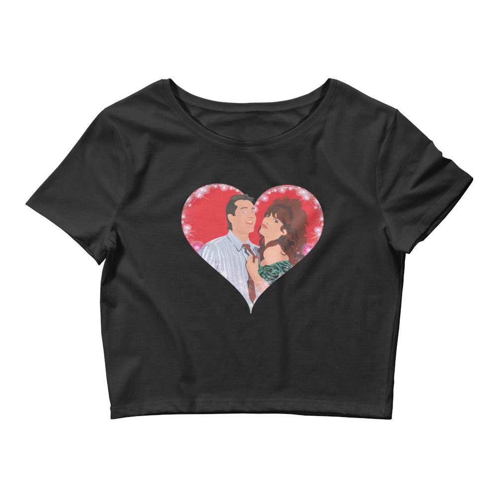 A playful pop art illustration of Al and Peggy Bundy from the classic TV show Married With Children. The shirt has the iconic couple wrapped in a warm embrace inside a shimmering heart, perfectly capturing their unique blend of humor and affection.