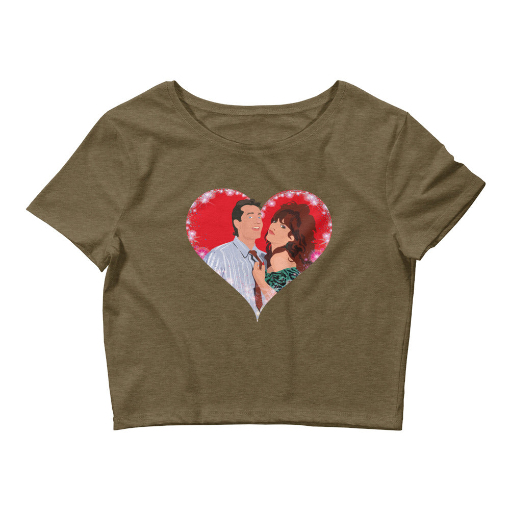 A playful pop art illustration of Al and Peggy Bundy from the classic TV show Married With Children. The shirt has the iconic couple wrapped in a warm embrace inside a shimmering heart, perfectly capturing their unique blend of humor and affection.